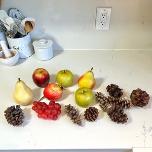 Bundle of faux fruit & real pine cones.